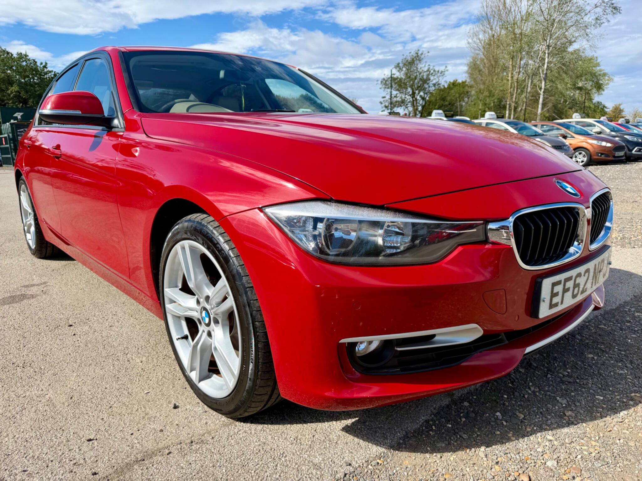 2012 BMW 3 Series in Red for sale