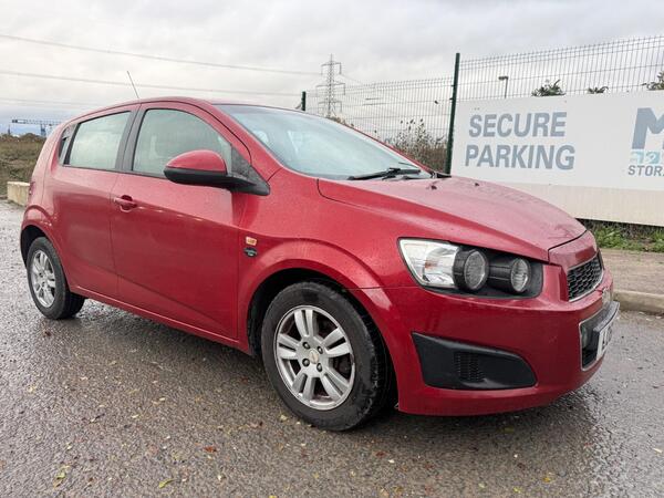 Red 2012 Chevrolet Aveo Hatchback Front-wheel drive Manual