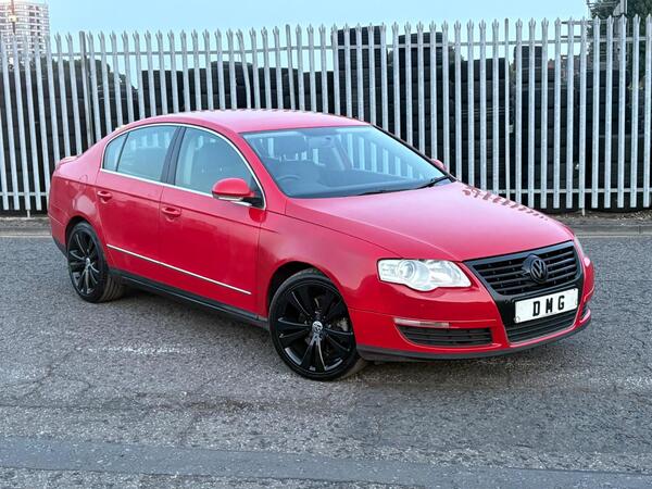 Red 2009 Volkswagen Passat Saloon Front-wheel drive Manual