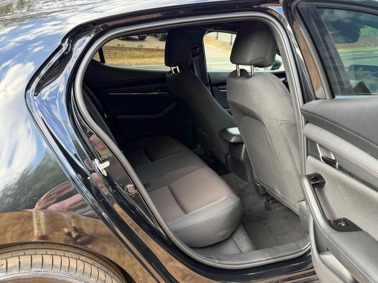 Mazda Mazda3 — photo 18