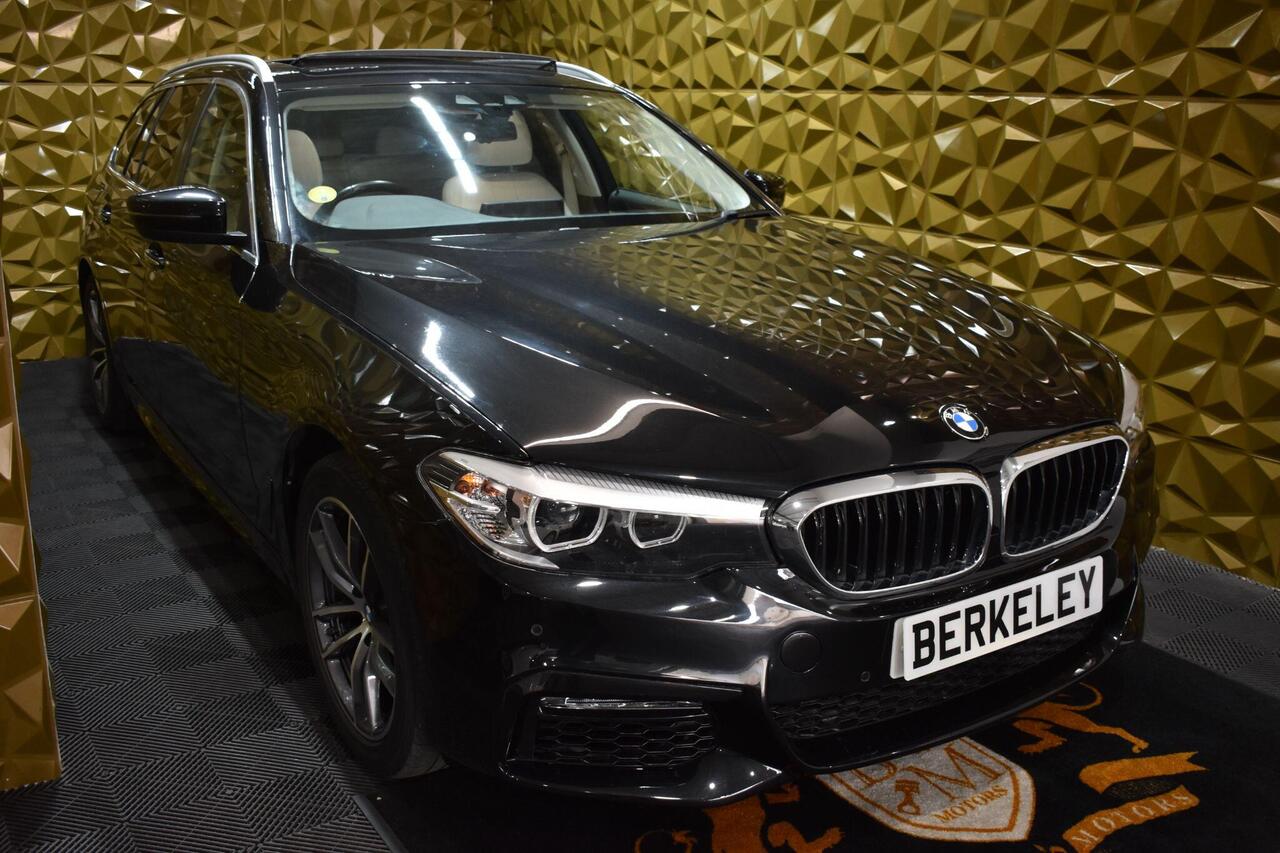 BMW 5 Series — photo 1