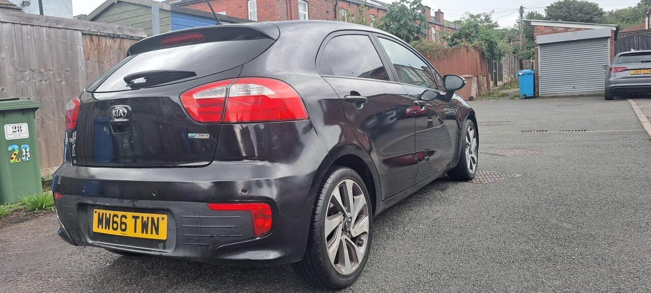 Kia Rio — photo 6