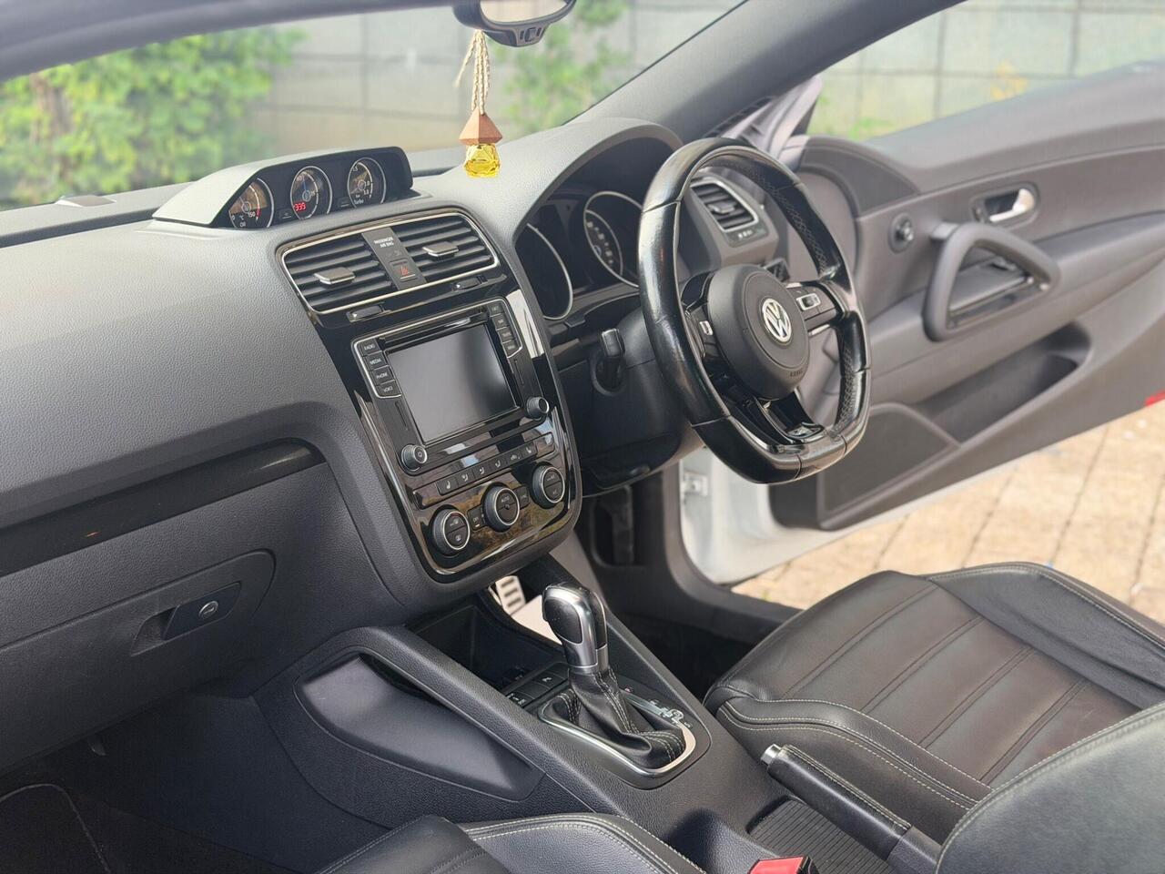 Volkswagen Scirocco — photo 13