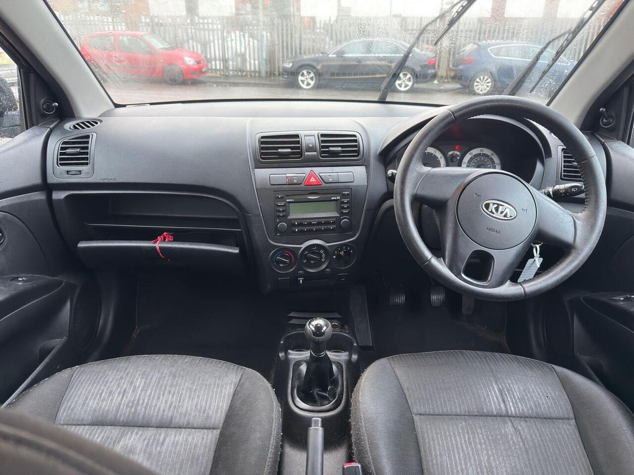Kia Picanto — photo 12