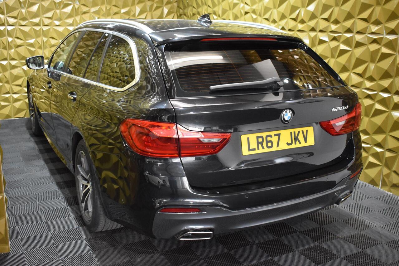 BMW 5 Series — photo 6