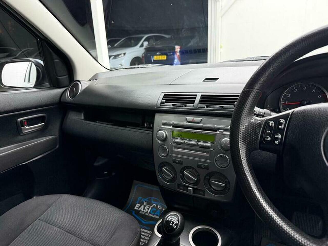 Mazda Mazda2 — photo 46