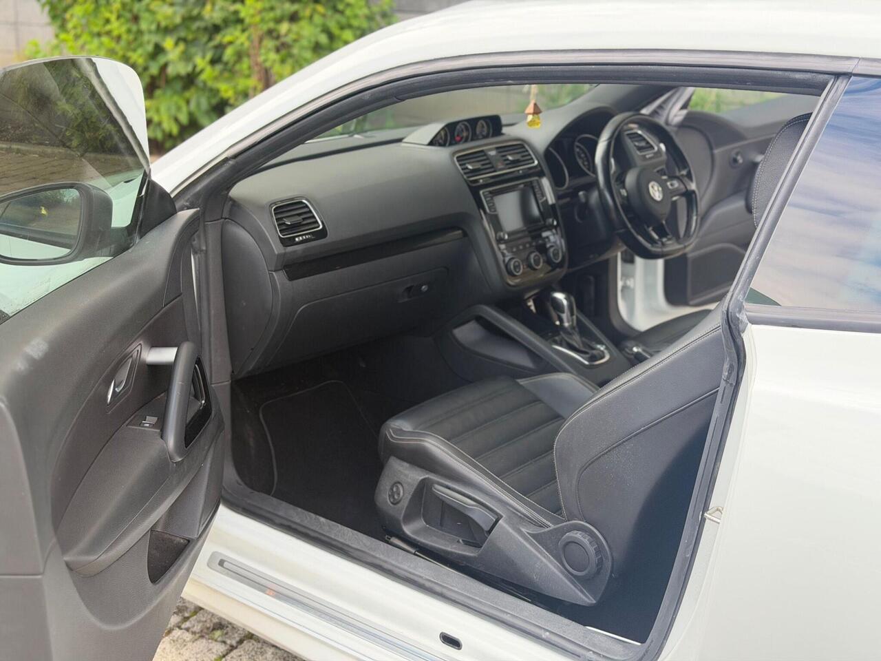 Volkswagen Scirocco — photo 12