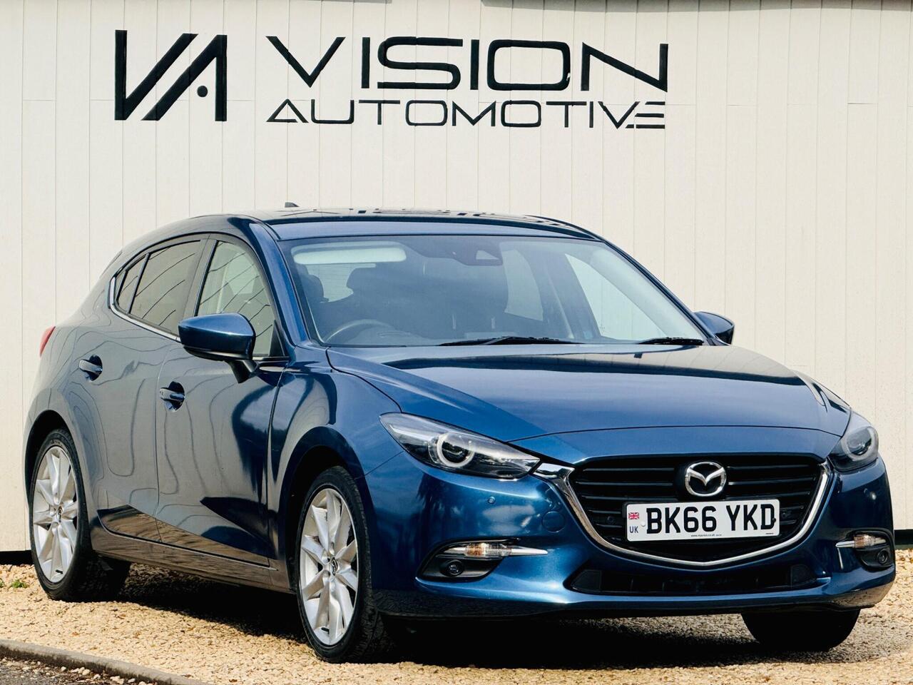 Mazda Mazda3 — photo 1
