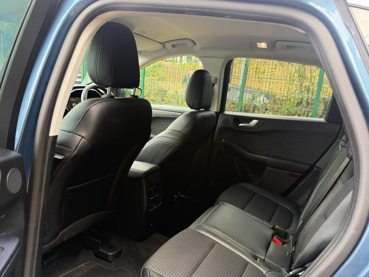 Ford Kuga — photo 34