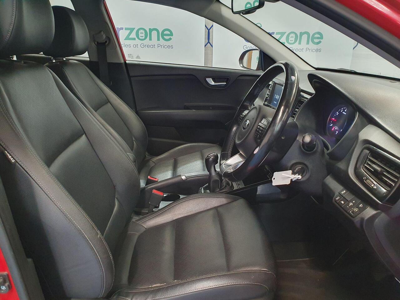 Kia Rio — photo 9