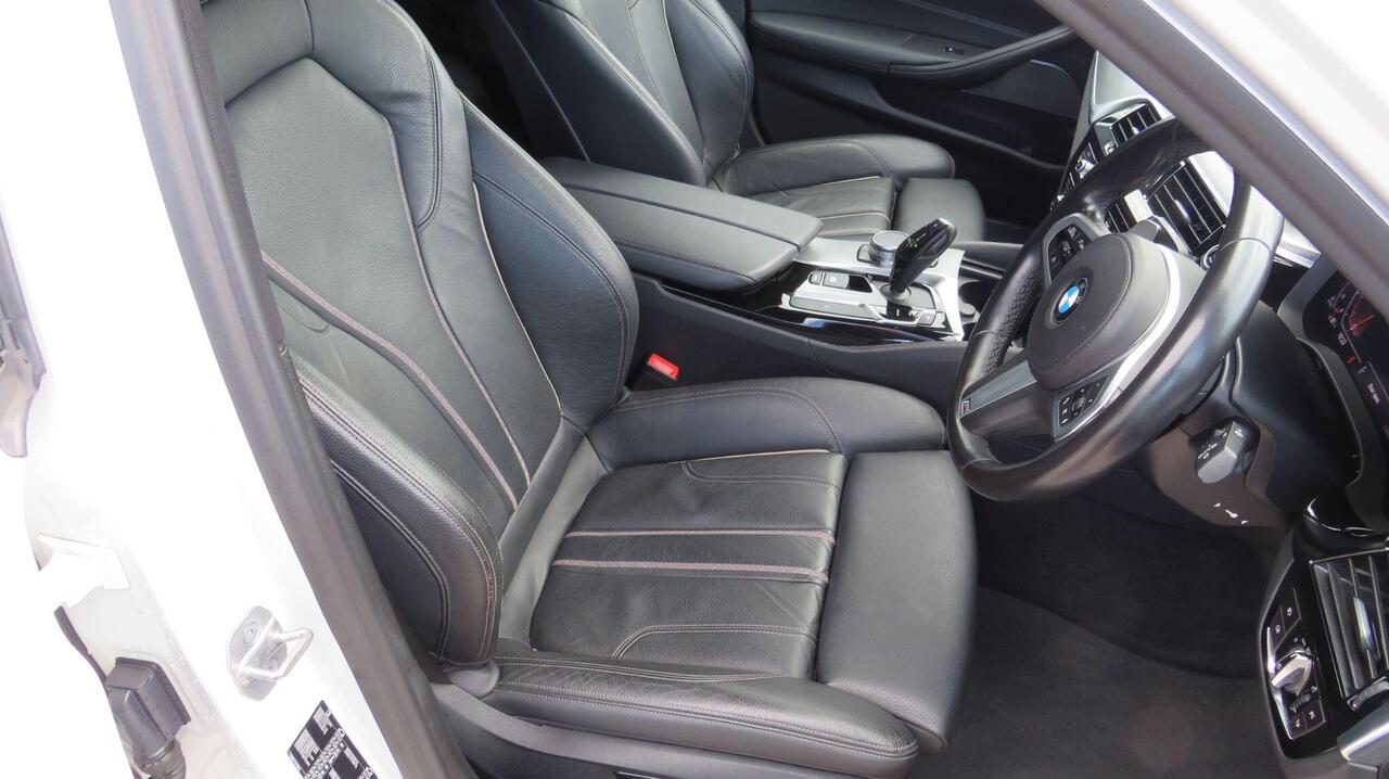 BMW 5 Series — photo 14