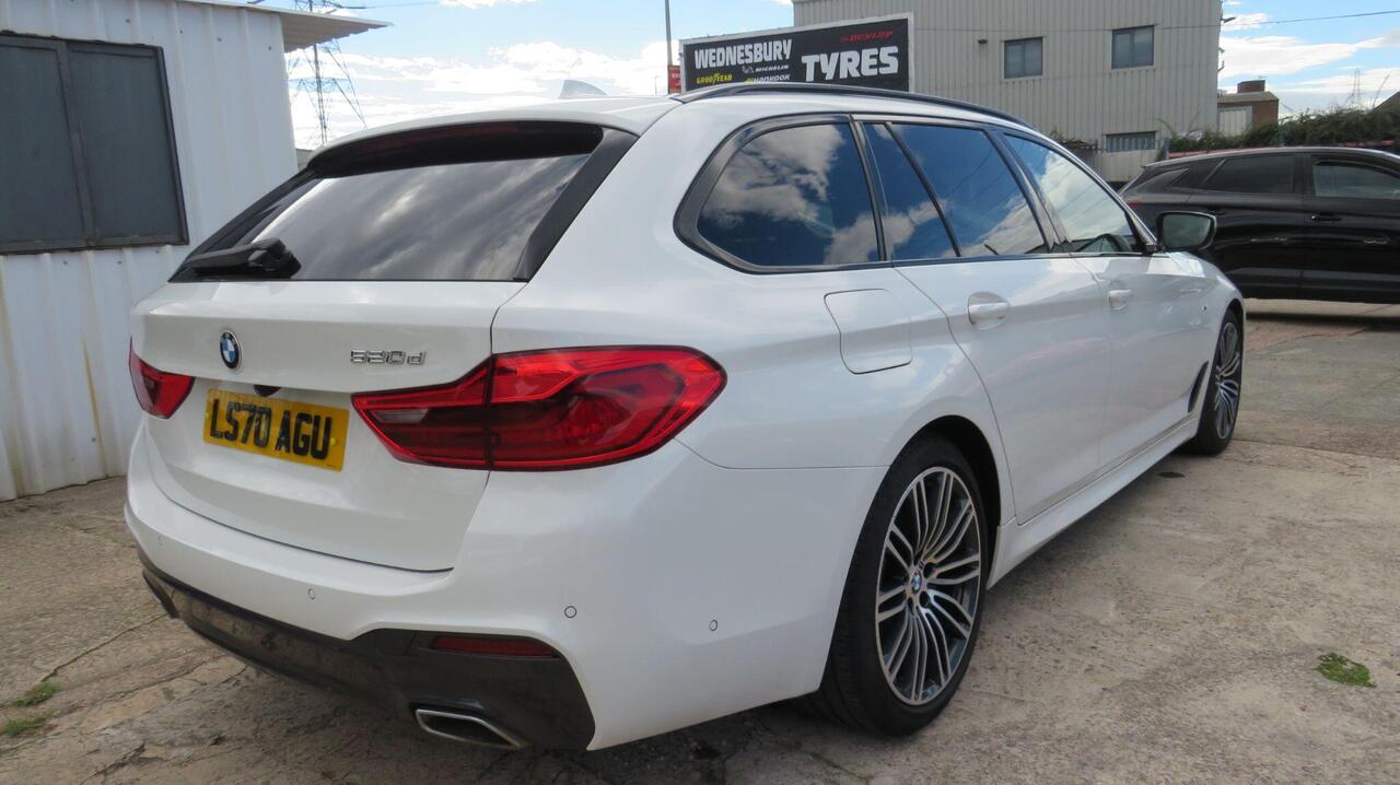 BMW 5 Series — photo 10