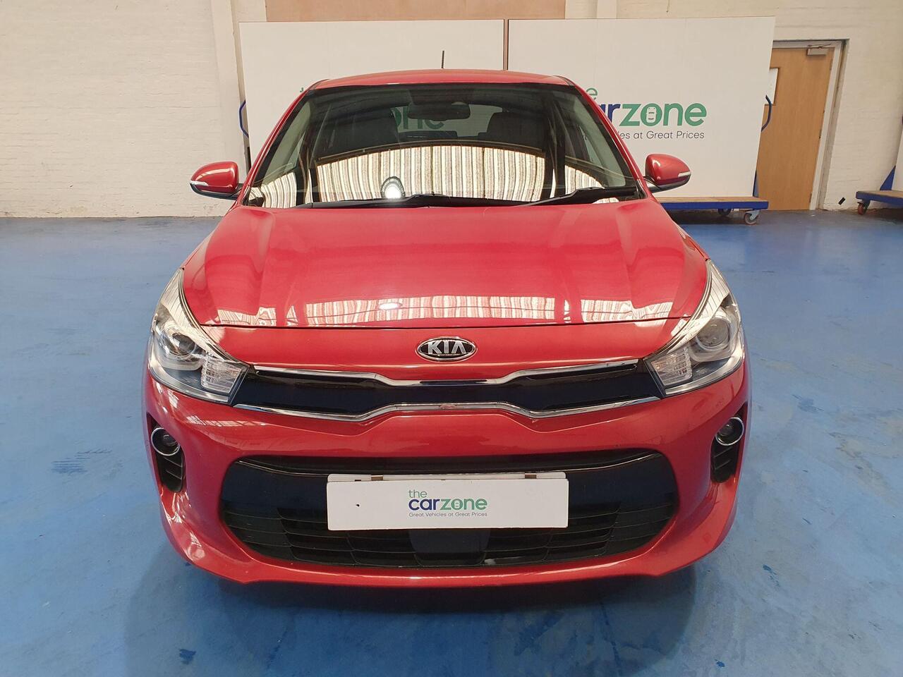 Kia Rio — photo 8