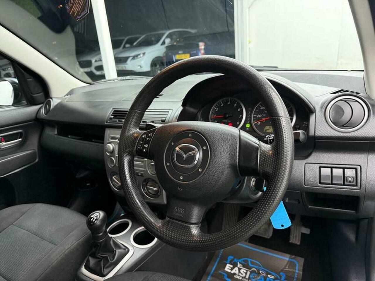 Mazda Mazda2 — photo 14