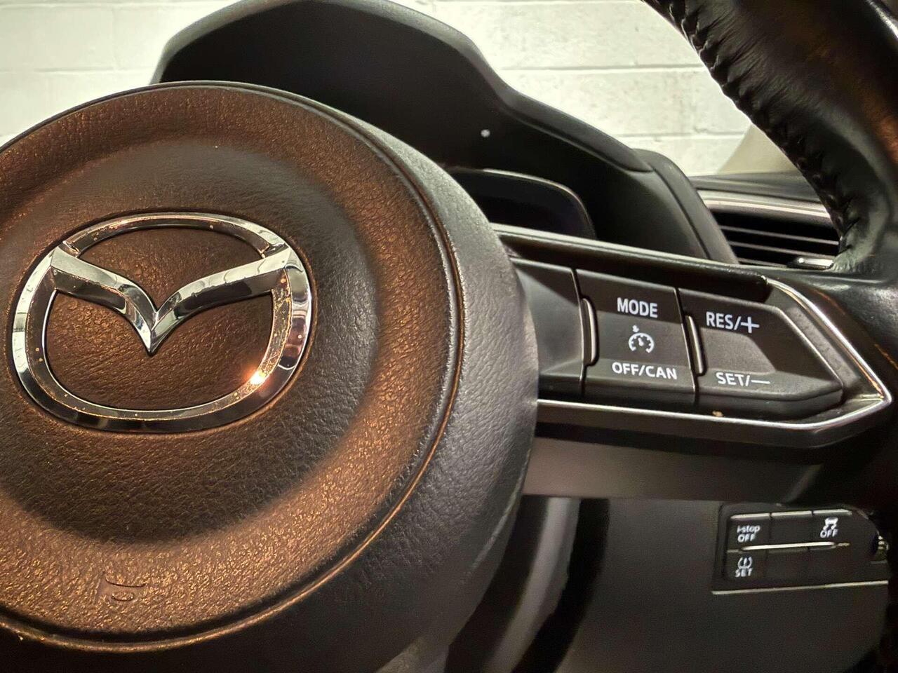 Mazda Mazda3 — photo 27