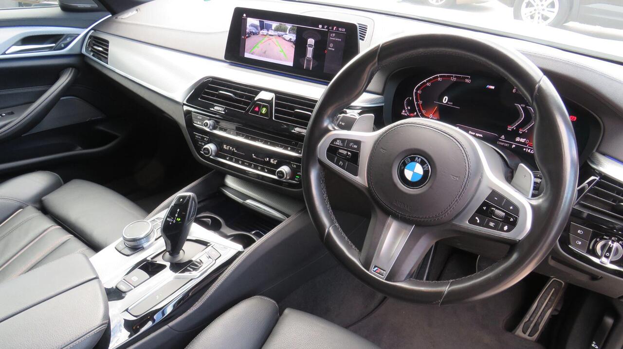 BMW 5 Series — photo 12