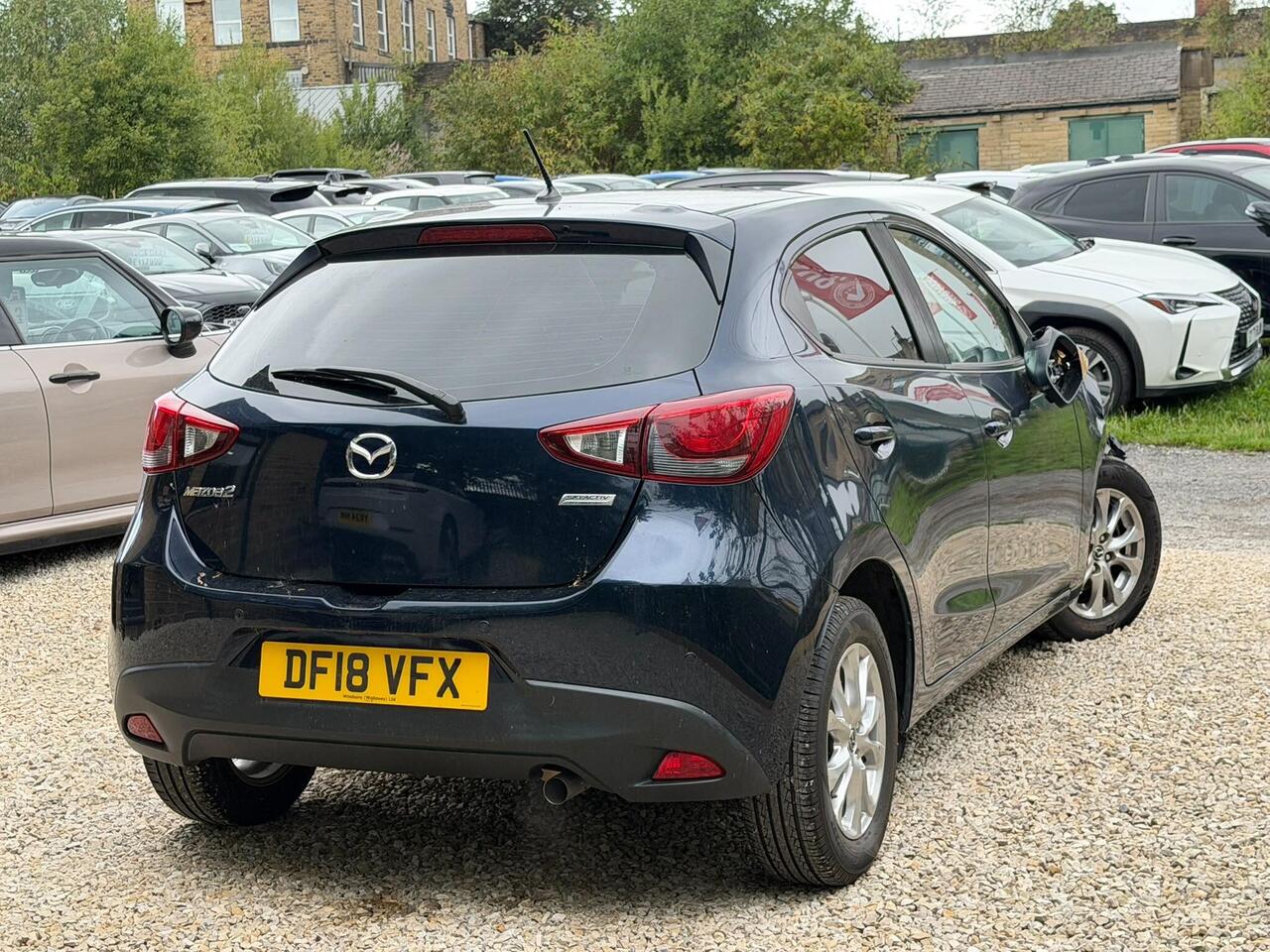 Mazda Mazda2 — photo 8
