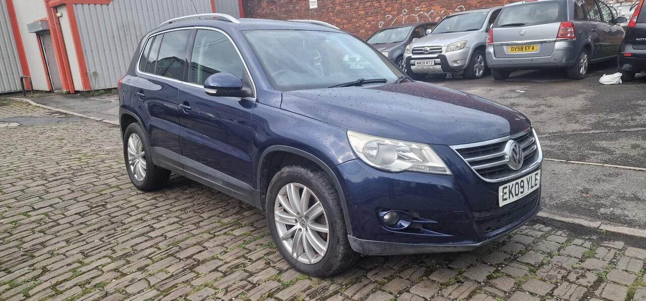 Volkswagen Tiguan — photo 1