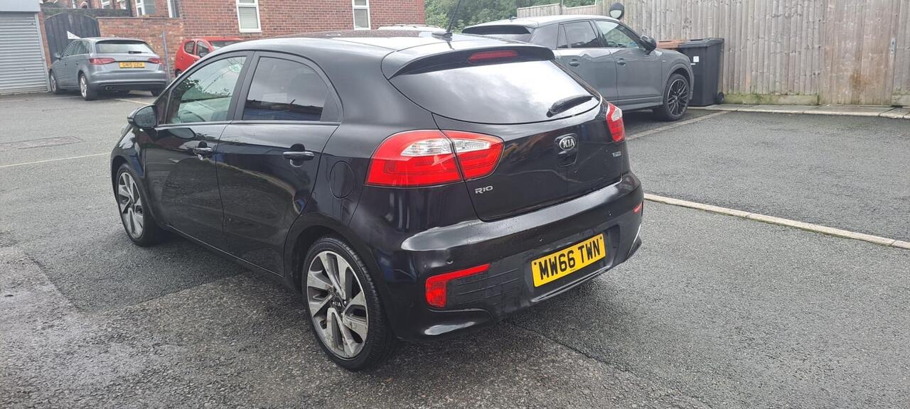 Kia Rio — photo 7