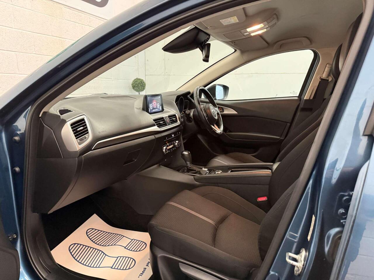 Mazda Mazda3 — photo 45