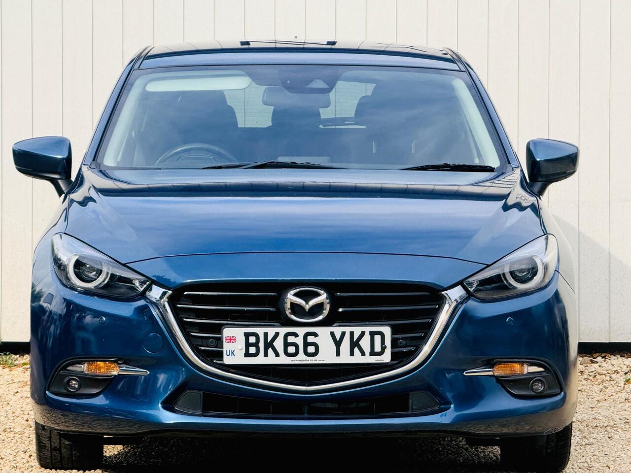 Mazda Mazda3 — photo 21
