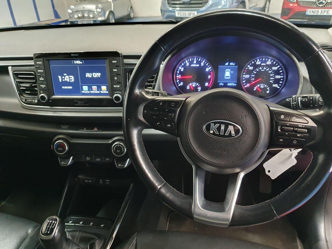 Kia Rio — photo 10