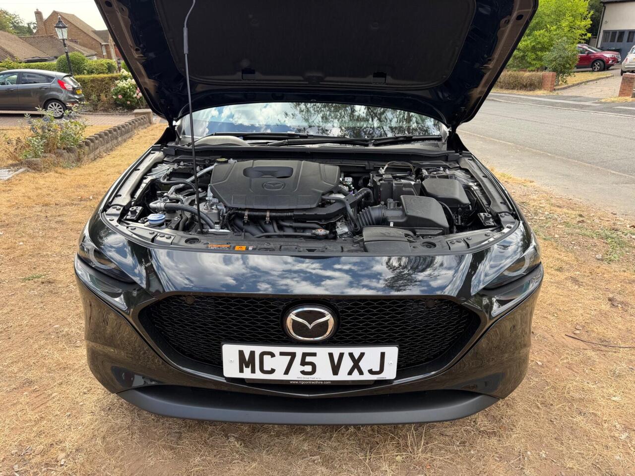 Mazda Mazda3 — photo 21