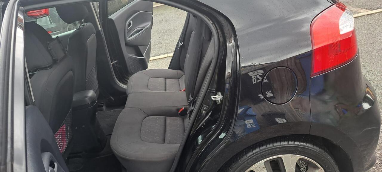 Kia Rio — photo 12