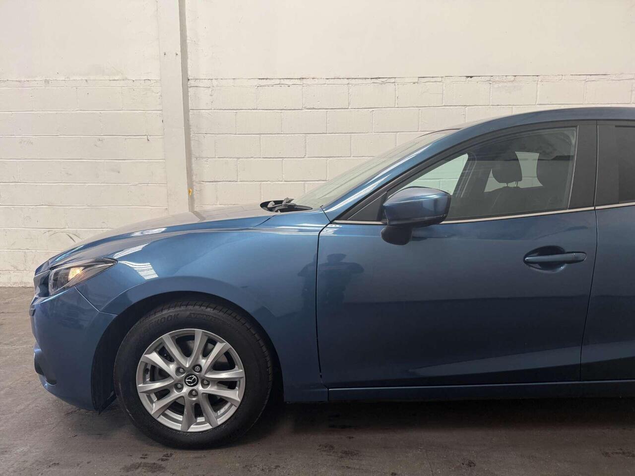 Mazda Mazda3 — photo 14