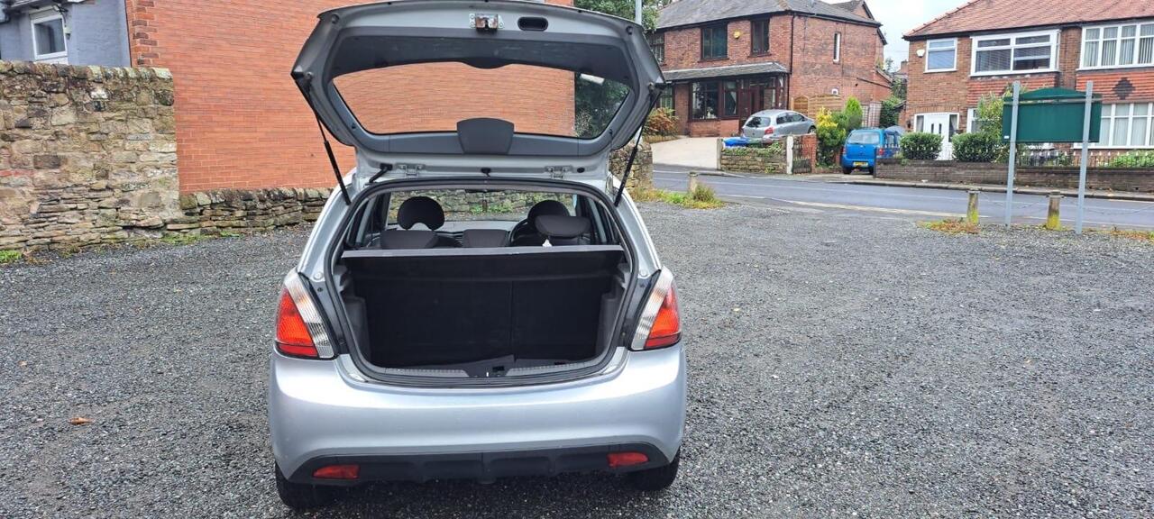 Kia Rio — photo 8