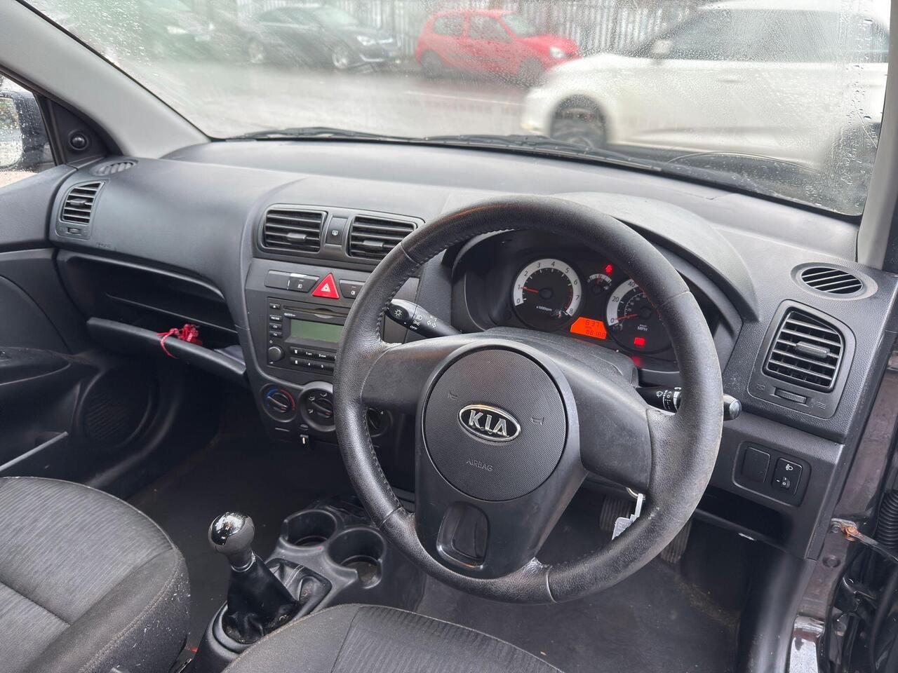 Kia Picanto — photo 11