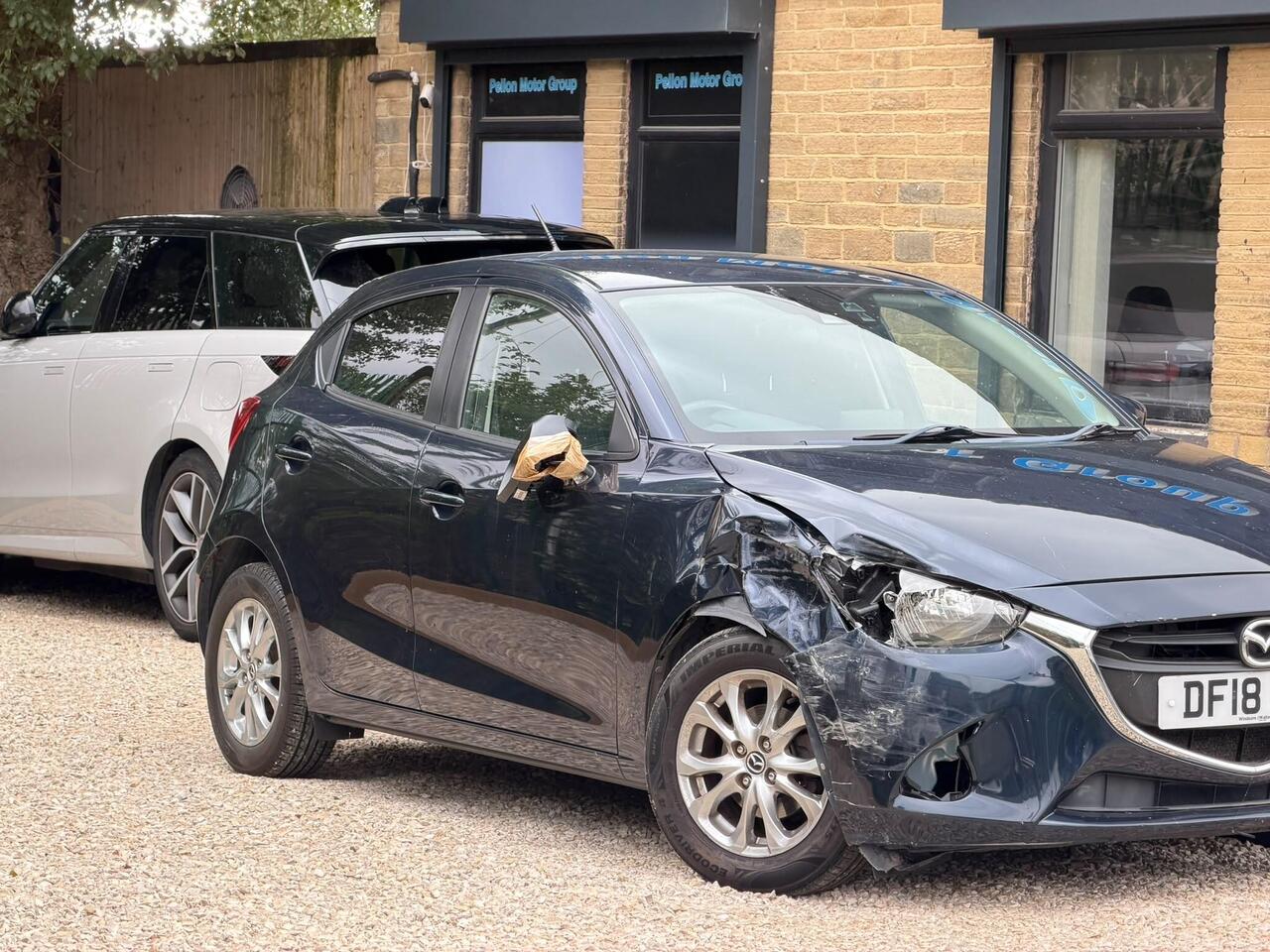 Mazda Mazda2 — photo 31