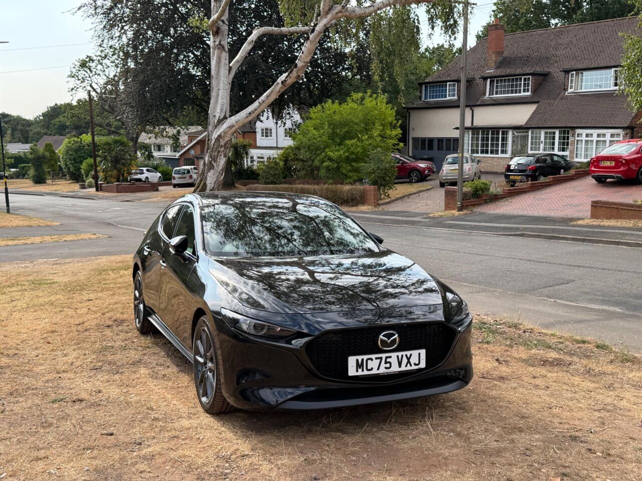 Mazda Mazda3 — photo 11