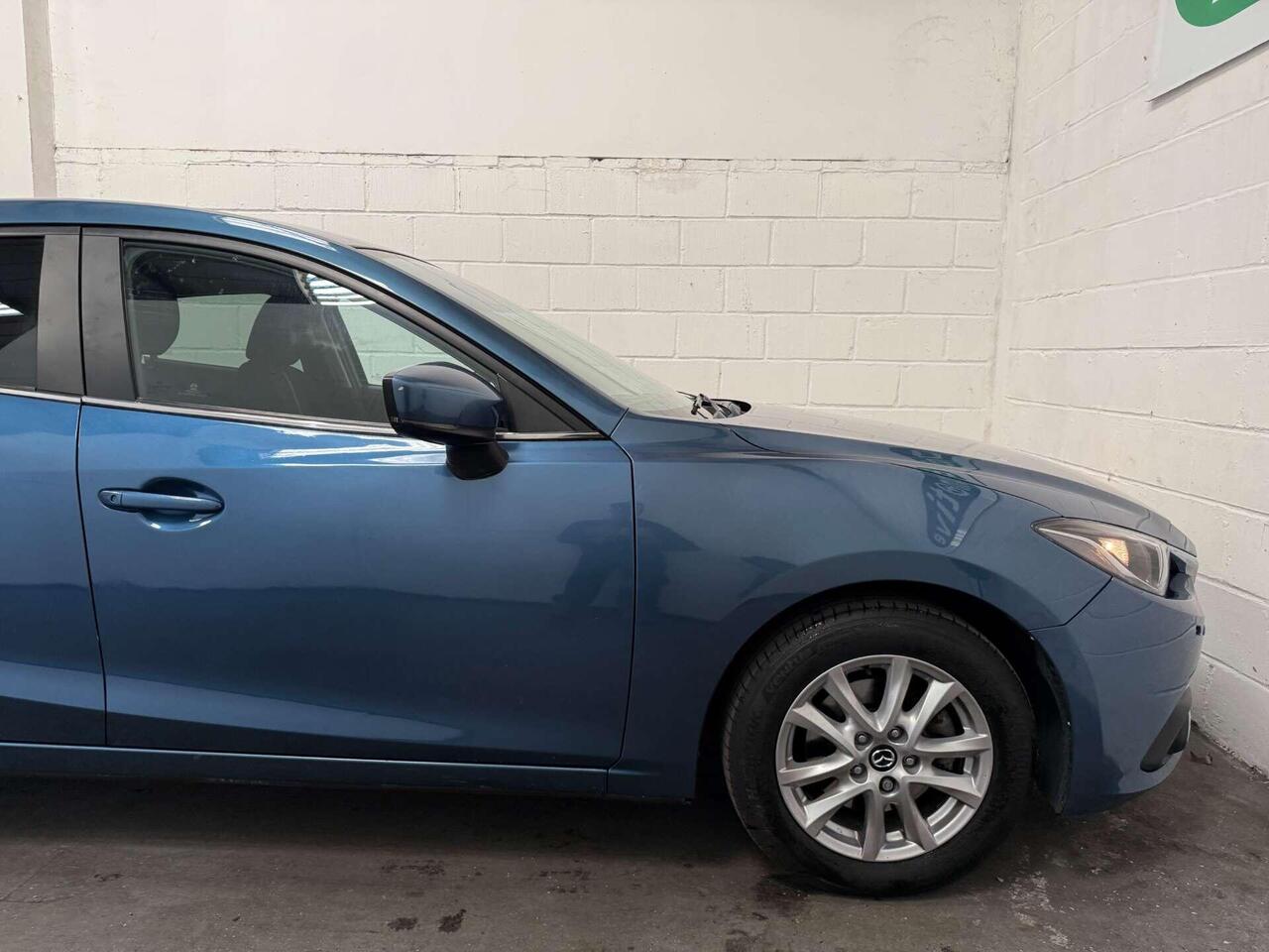 Mazda Mazda3 — photo 21