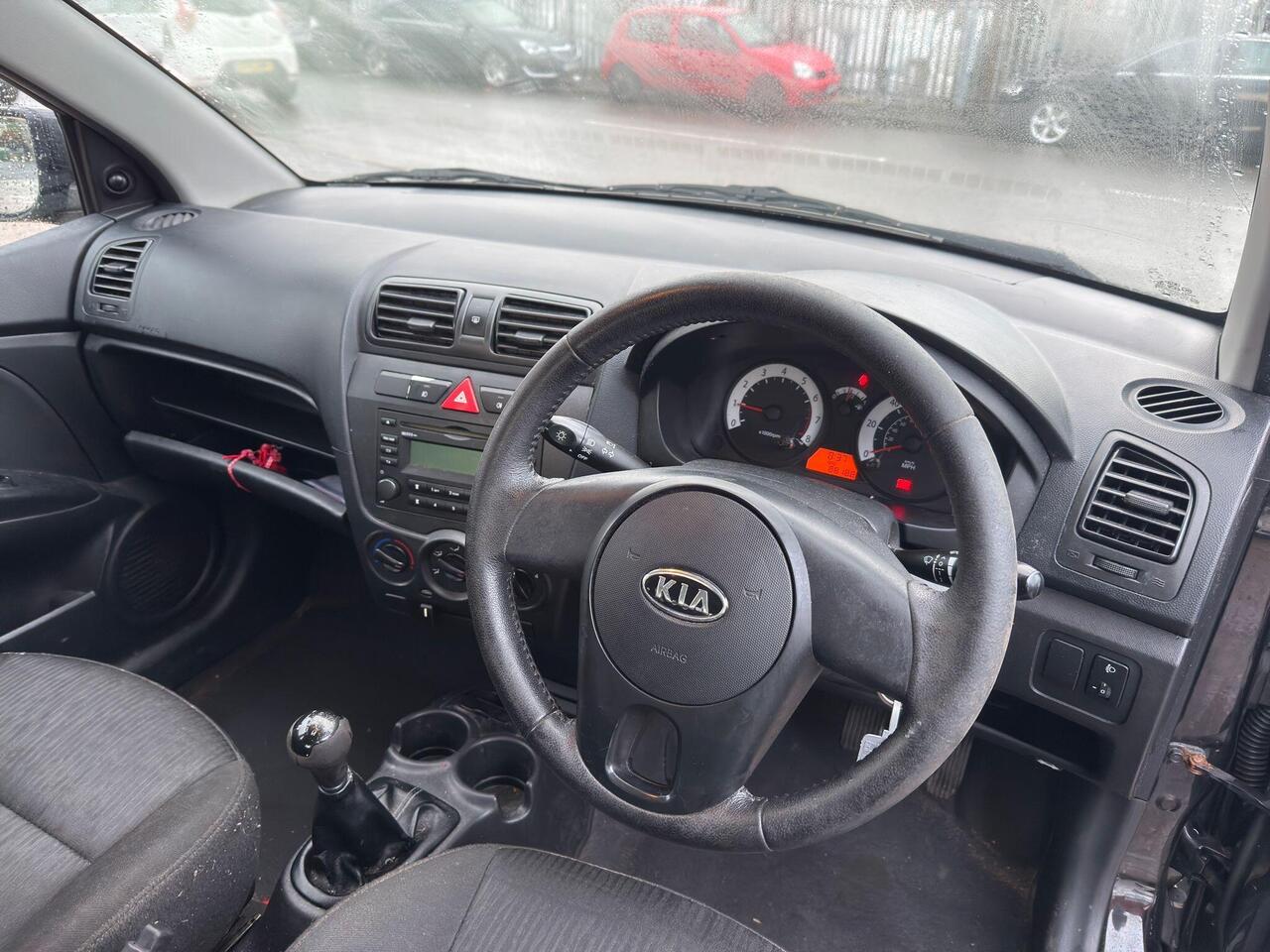 Kia Picanto — photo 10