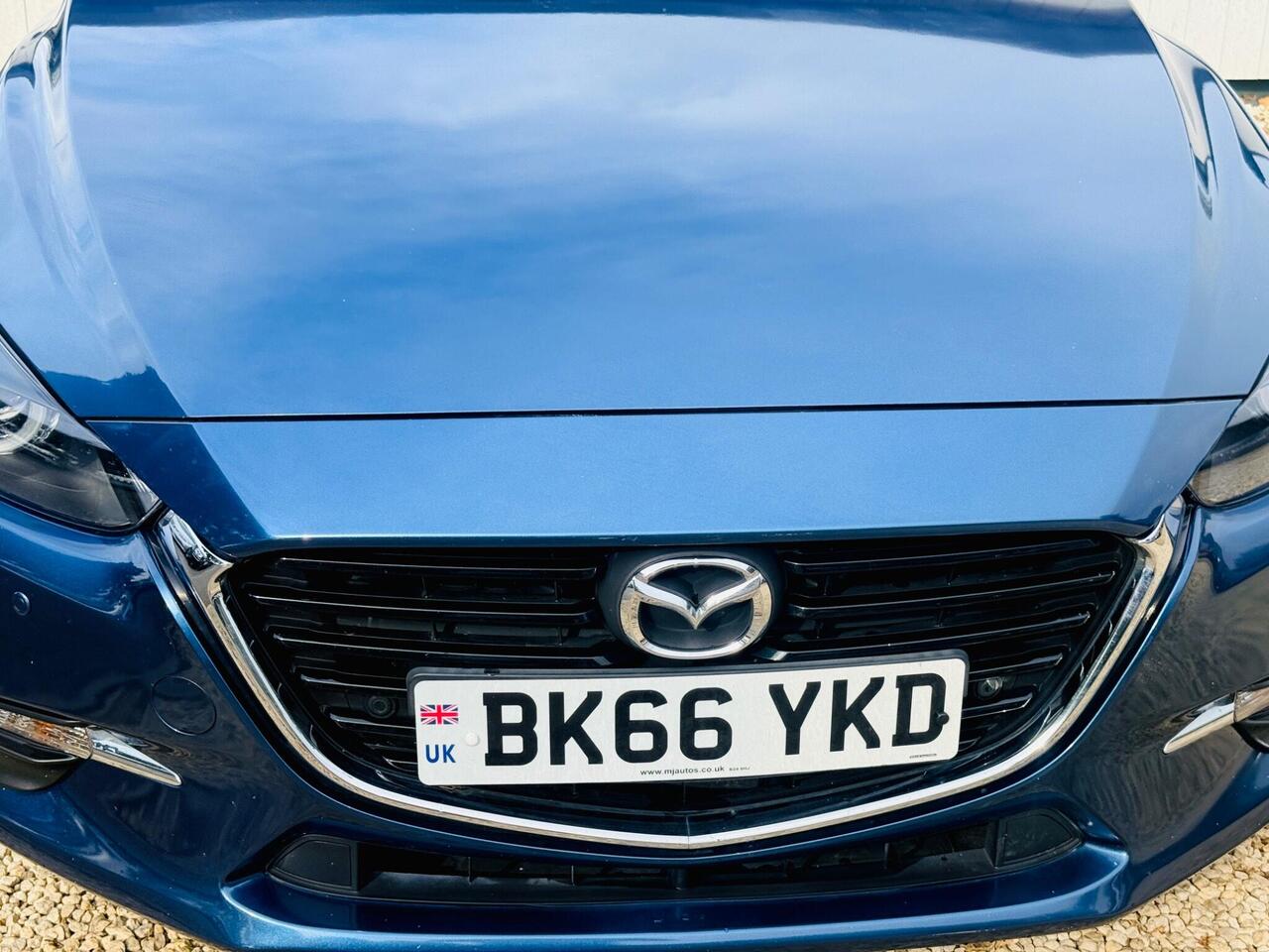 Mazda Mazda3 — photo 23