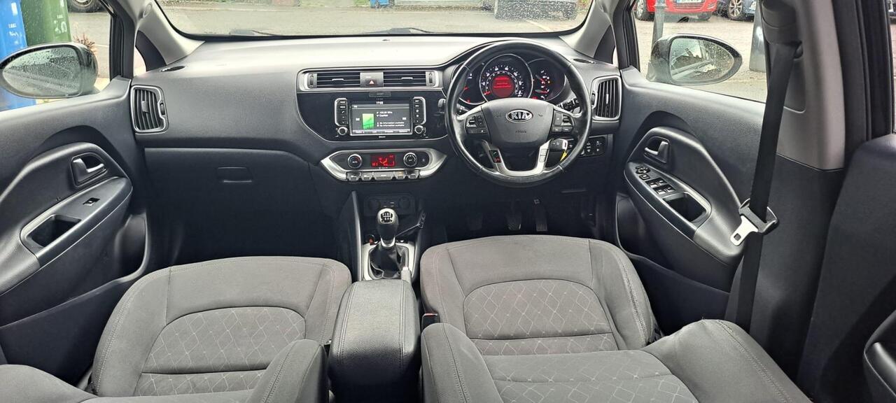Kia Rio — photo 5
