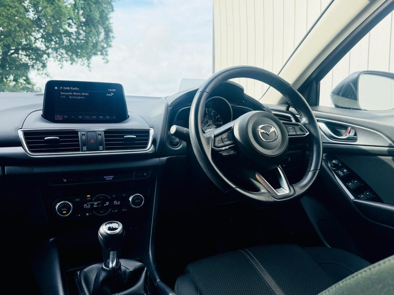 Mazda Mazda3 — photo 25
