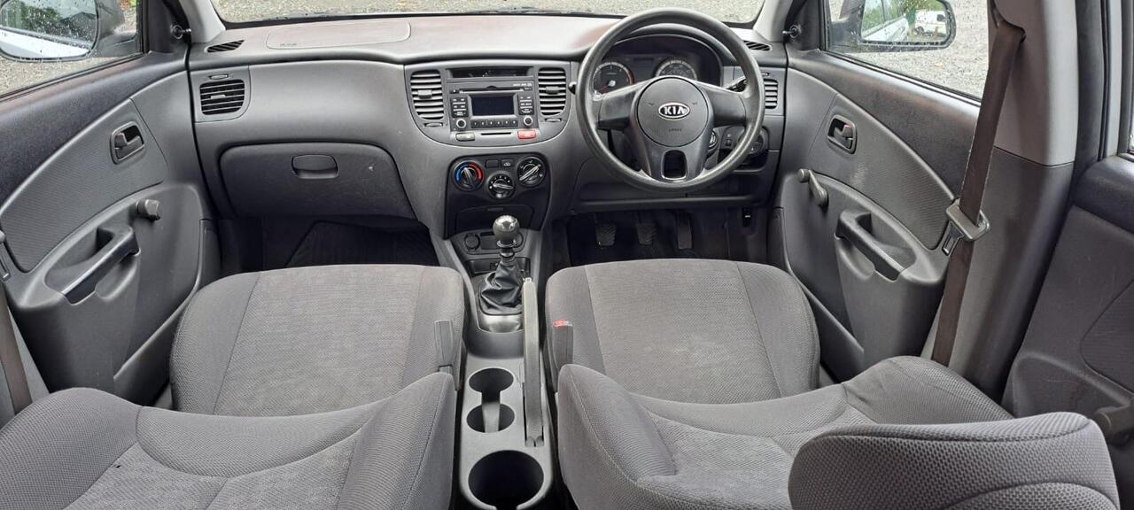 Kia Rio — photo 14