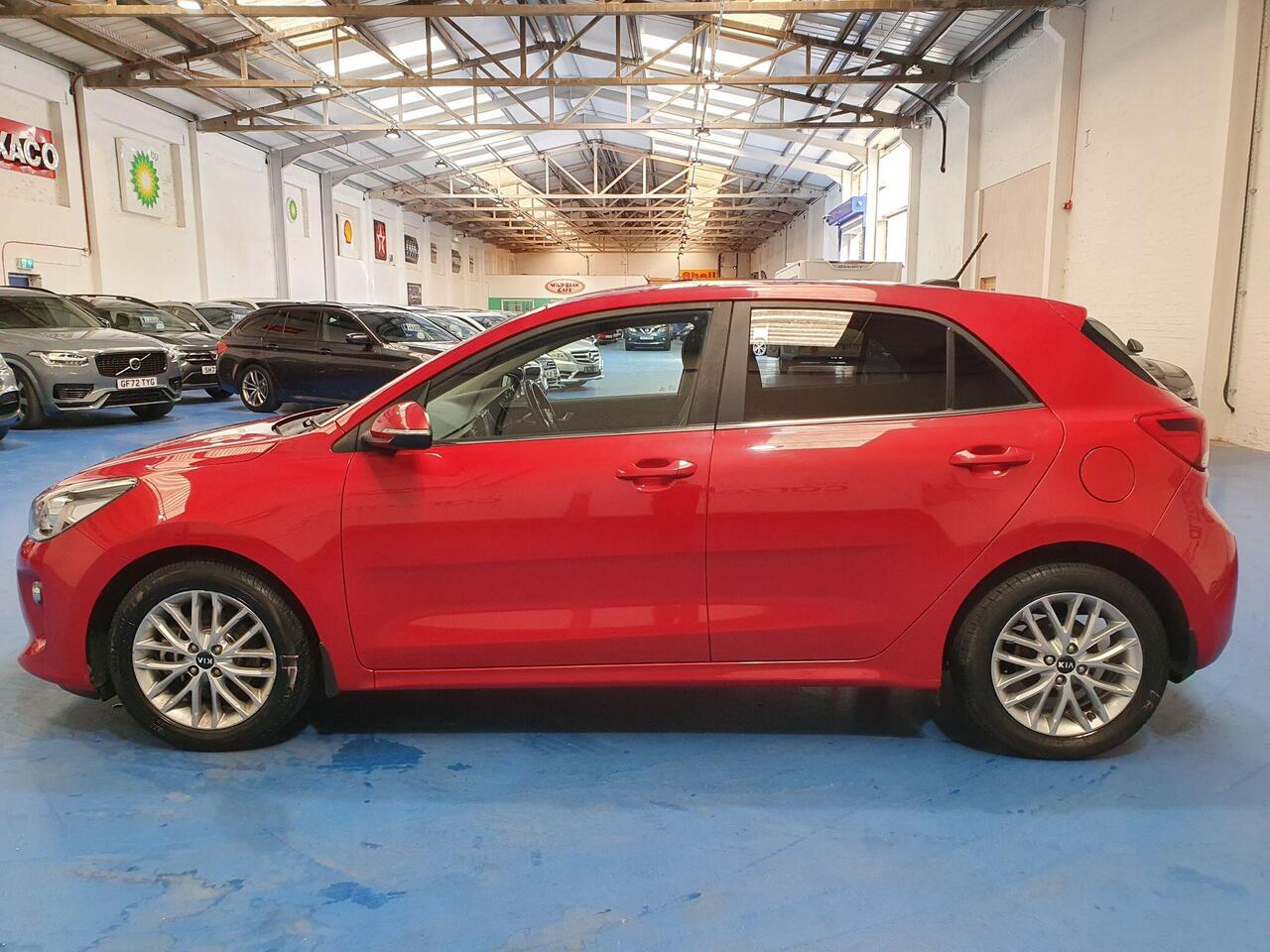 Kia Rio — photo 6