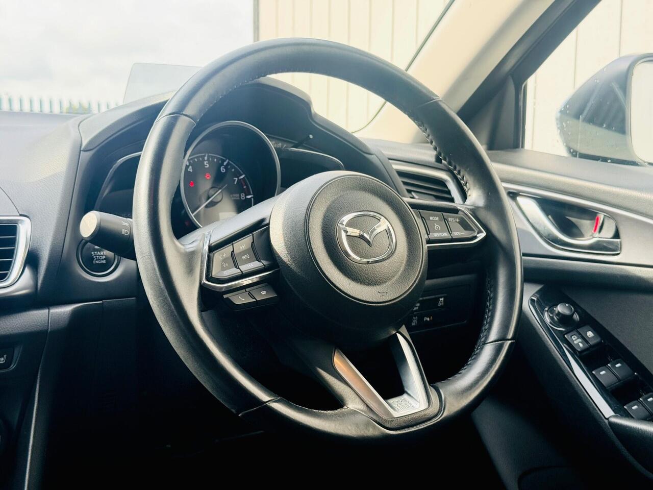 Mazda Mazda3 — photo 26