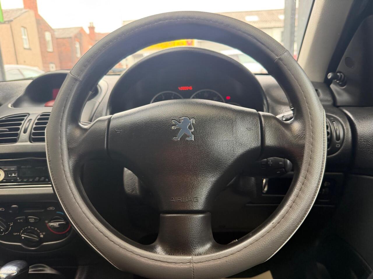Peugeot 206 — photo 20