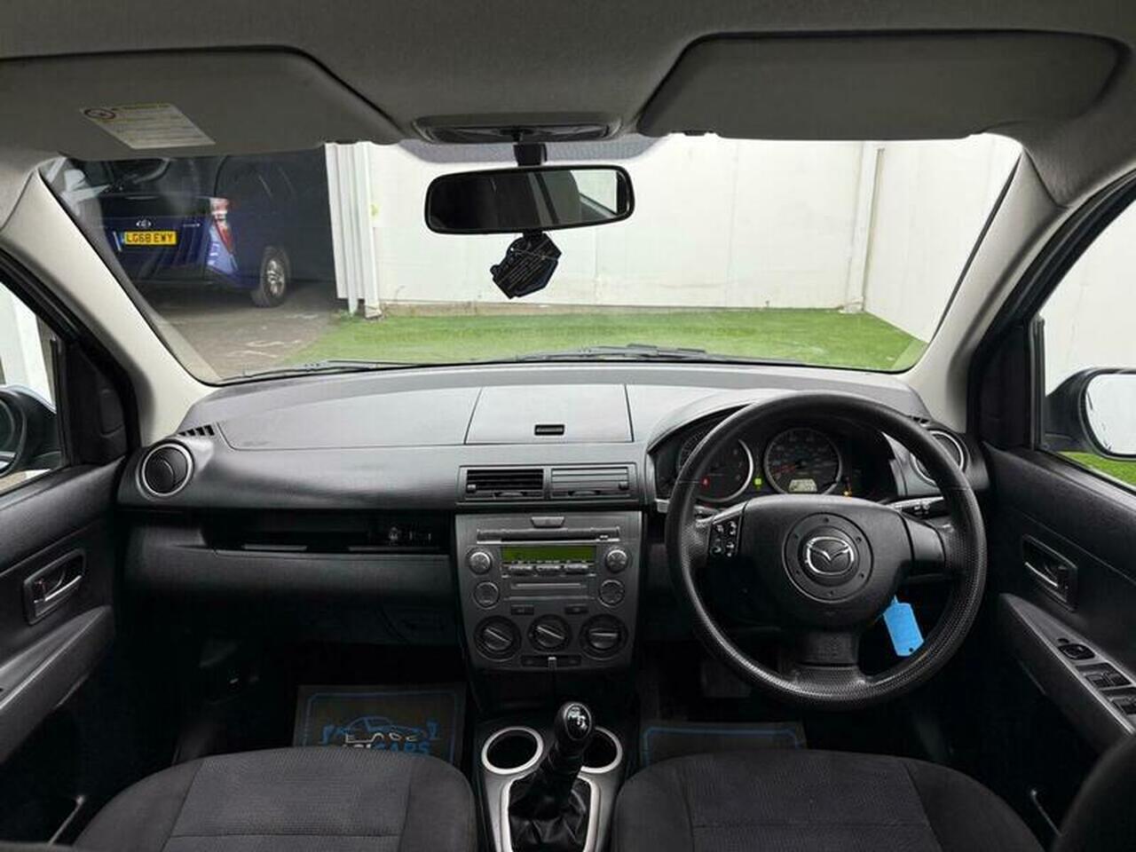 Mazda Mazda2 — photo 27