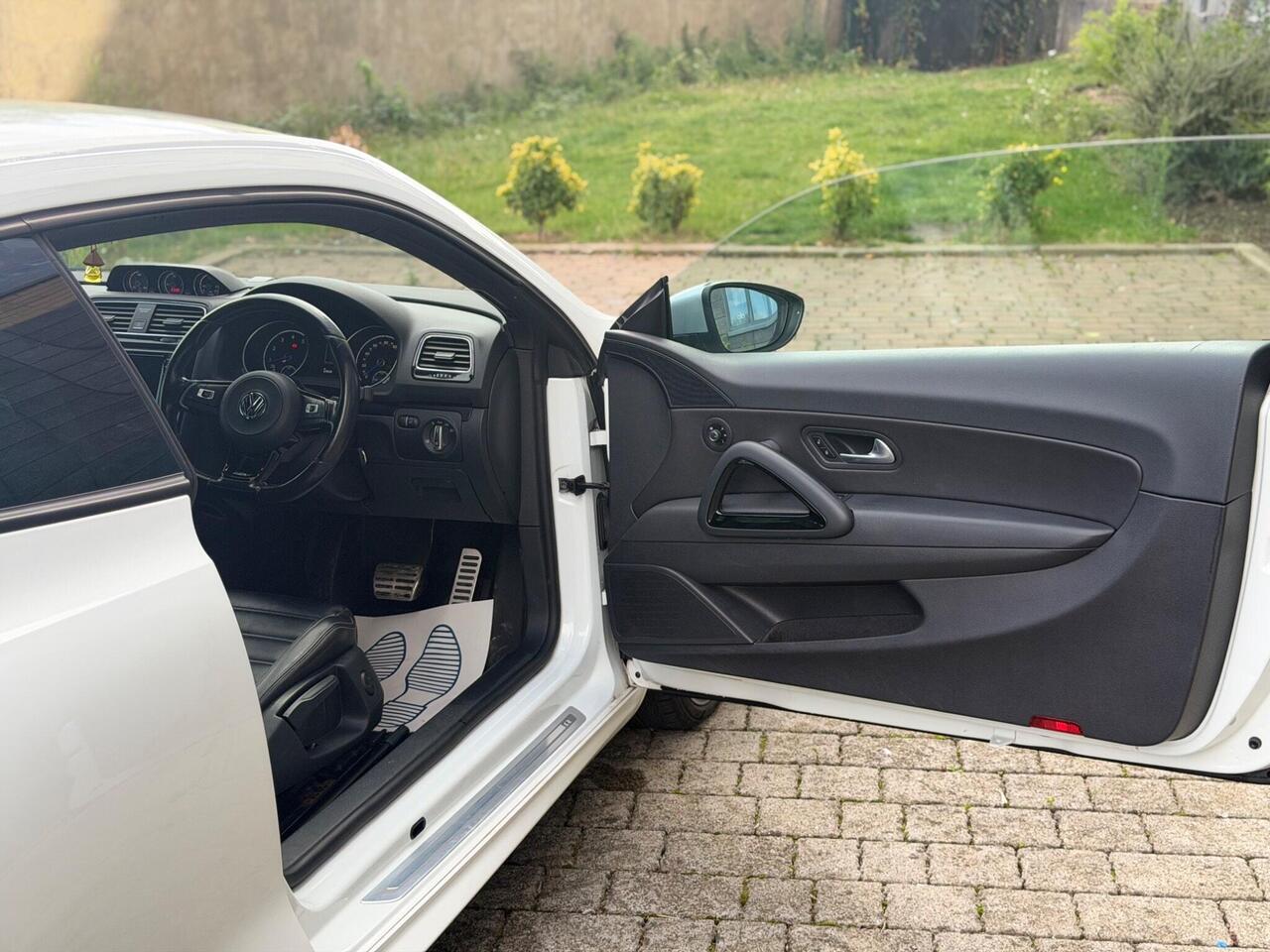 Volkswagen Scirocco — photo 11