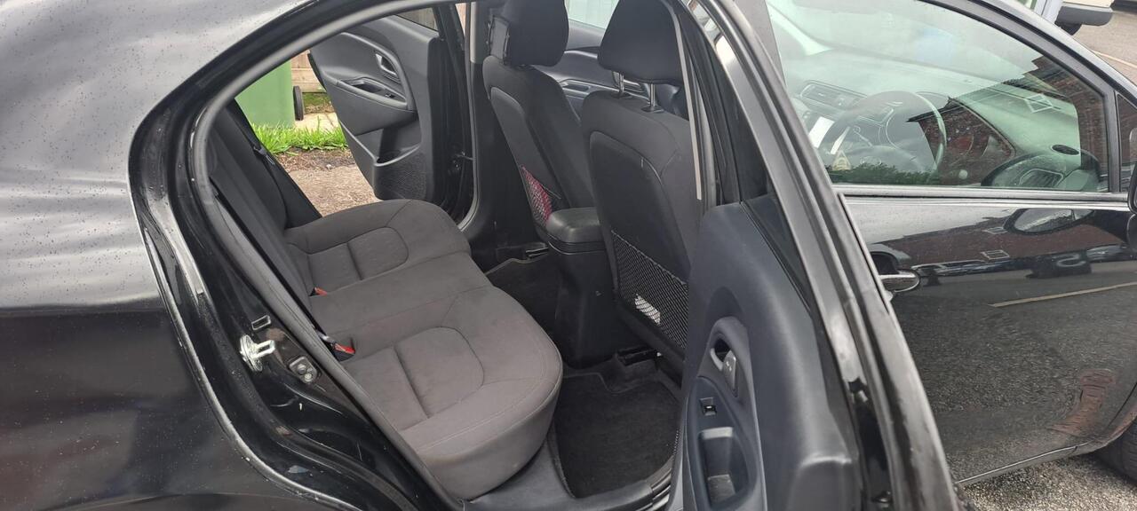 Kia Rio — photo 13