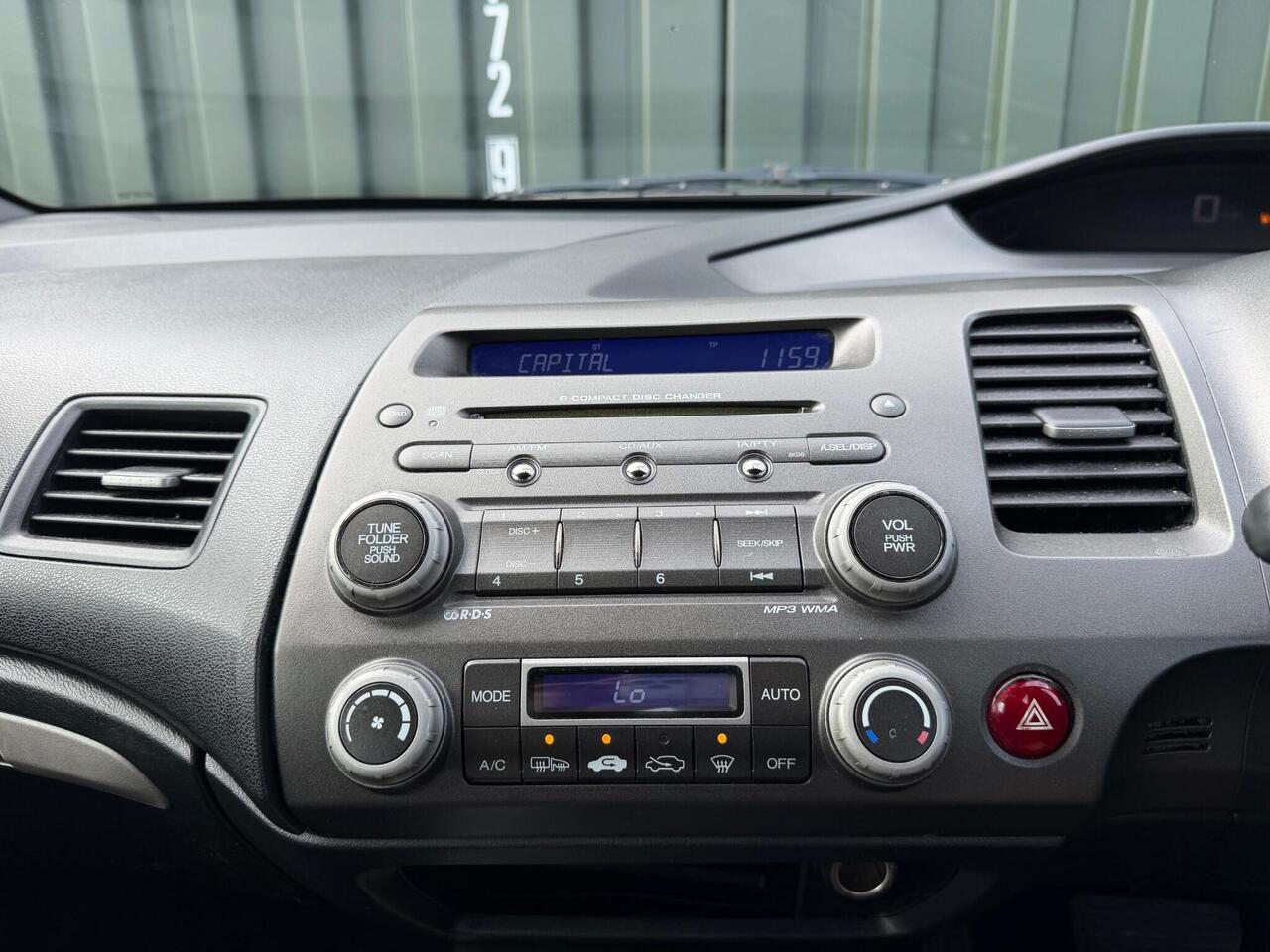 Honda Civic — photo 17