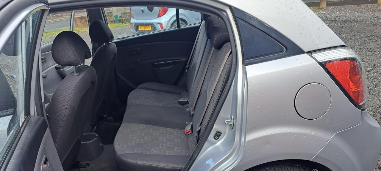 Kia Rio — photo 9
