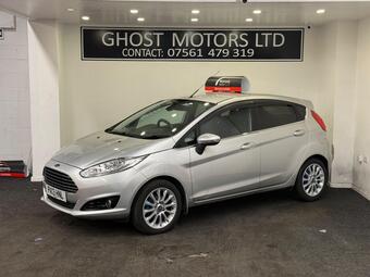 2013 POPULAR HATCHBACK IS EQUIPPED WITH A 1.0L PETROL ENGINE AND FEATURES THE TITANIUM... photo