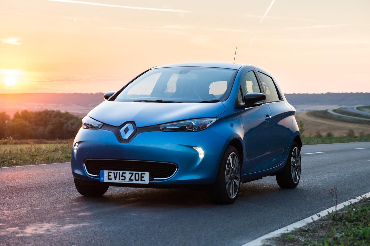 Renault Zoe A blue Renault Zoe parked against a sunset background
