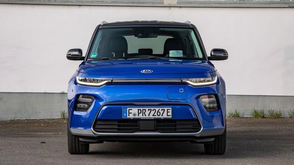 Blue Kia Soul EV parked on a drive